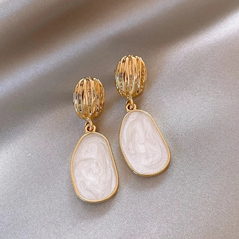 Chloé | Boucles d’oreilles ovales nacrées