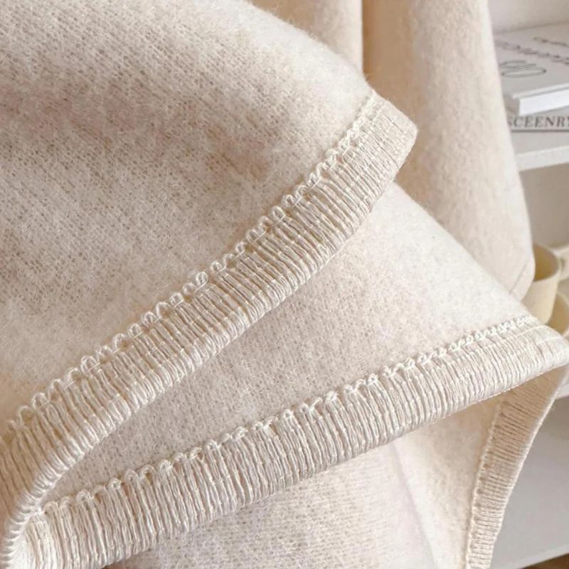 Le châle drapé en polaire luxe