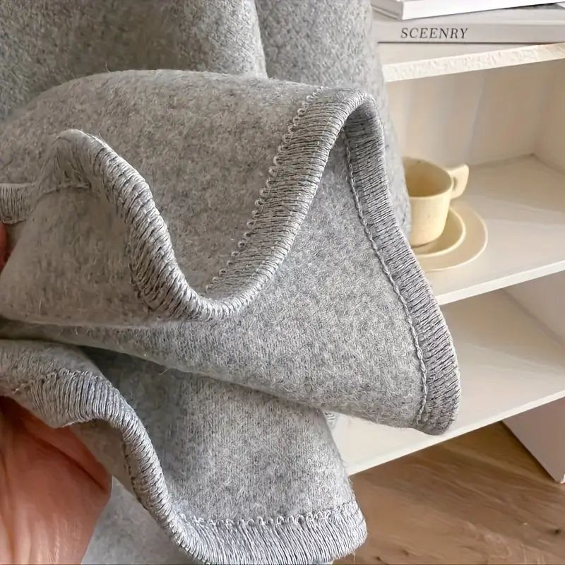 Le châle drapé en polaire luxe