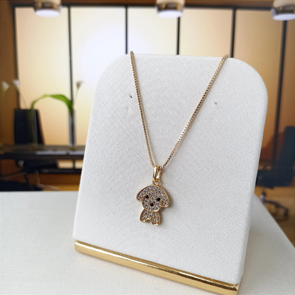 Collier avec pendentif en forme de caniche en or