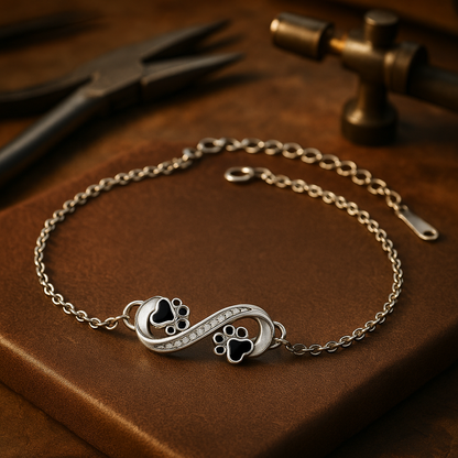 Bracelet avec symbole de l'infini, pendentif avec empreinte de patte et zircons
