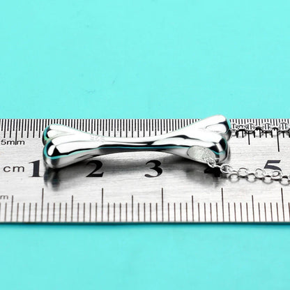 collier avec pendentif en forme d'os pour chiens