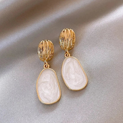 Chloé | Boucles d’oreilles ovales nacrées