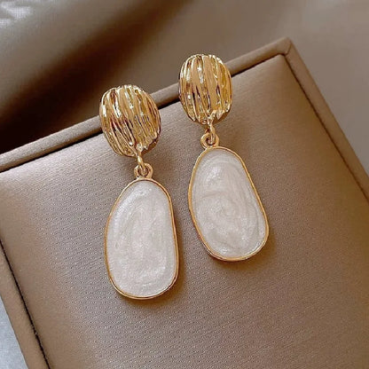 Chloé | Boucles d’oreilles ovales nacrées