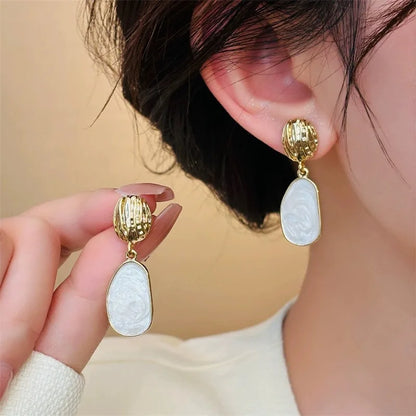 Chloé | Boucles d’oreilles ovales nacrées