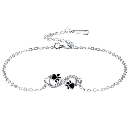 Bracelet avec symbole de l'infini, pendentif avec empreinte de patte et zircons